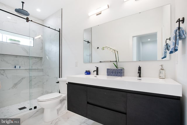 bathroom with vanity, toilet, and a shower with door