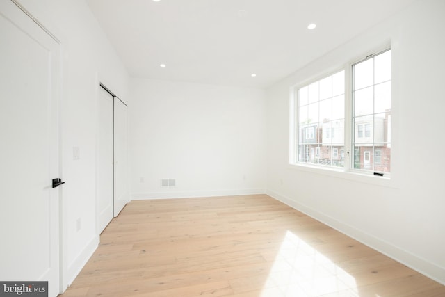 unfurnished bedroom with light hardwood / wood-style flooring