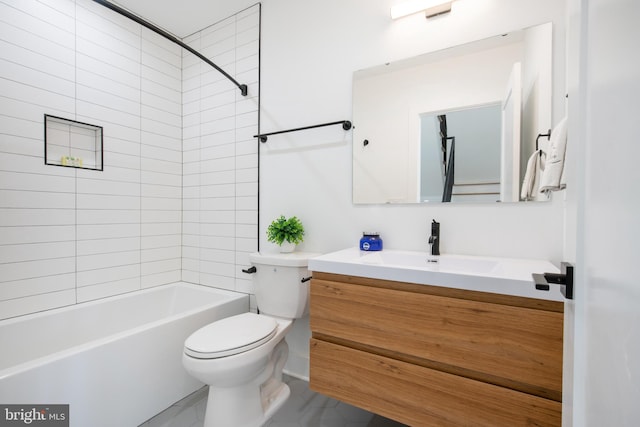 full bathroom with tiled shower / bath combo, vanity, and toilet