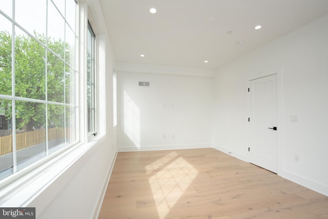 empty room featuring light hardwood / wood-style floors