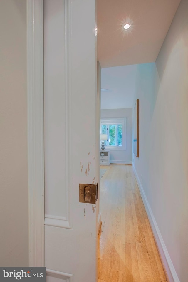 corridor featuring light wood-type flooring