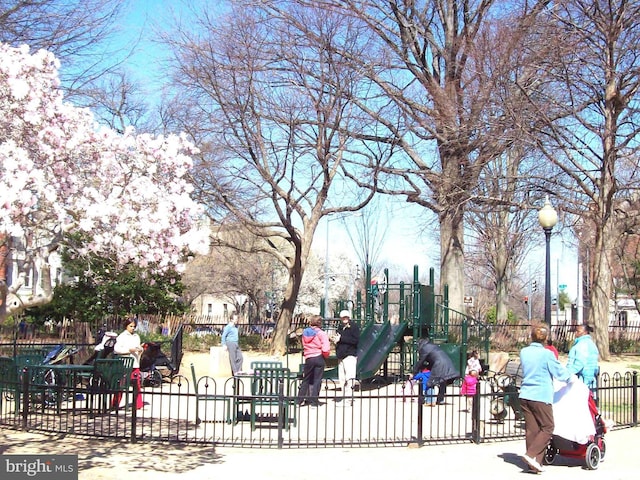 view of home's community featuring a playground