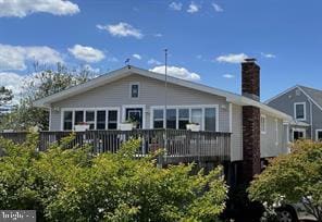 rear view of house with a deck