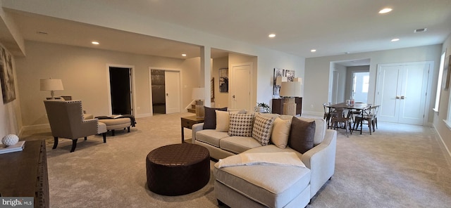 living room with light colored carpet