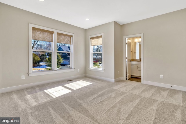 view of carpeted spare room