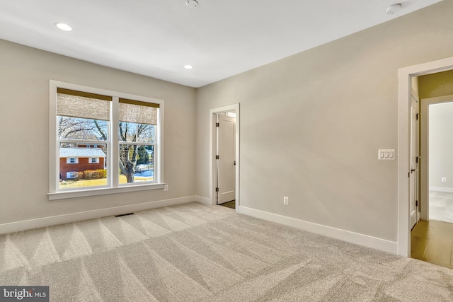 view of carpeted spare room