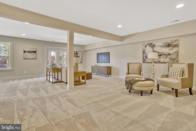 sitting room with light carpet