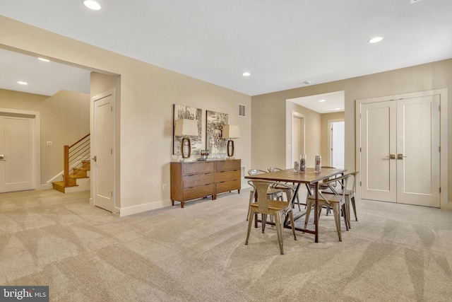 view of carpeted dining space