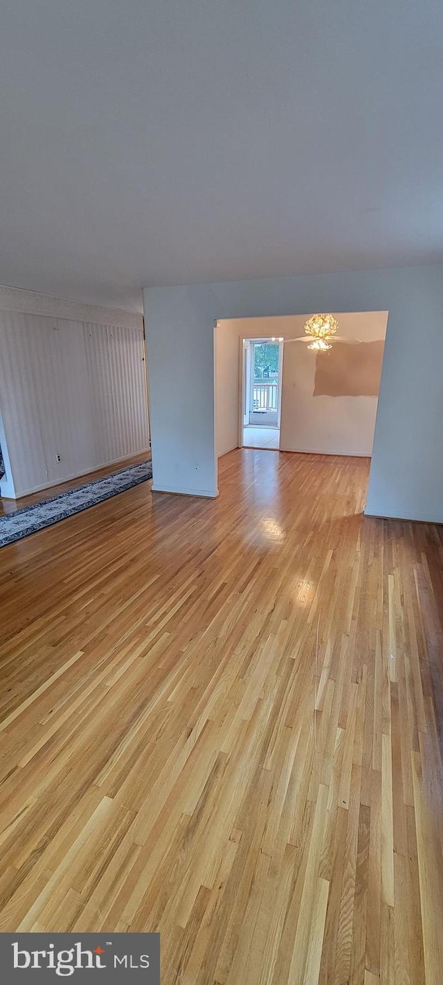 unfurnished living room featuring light wood-type flooring