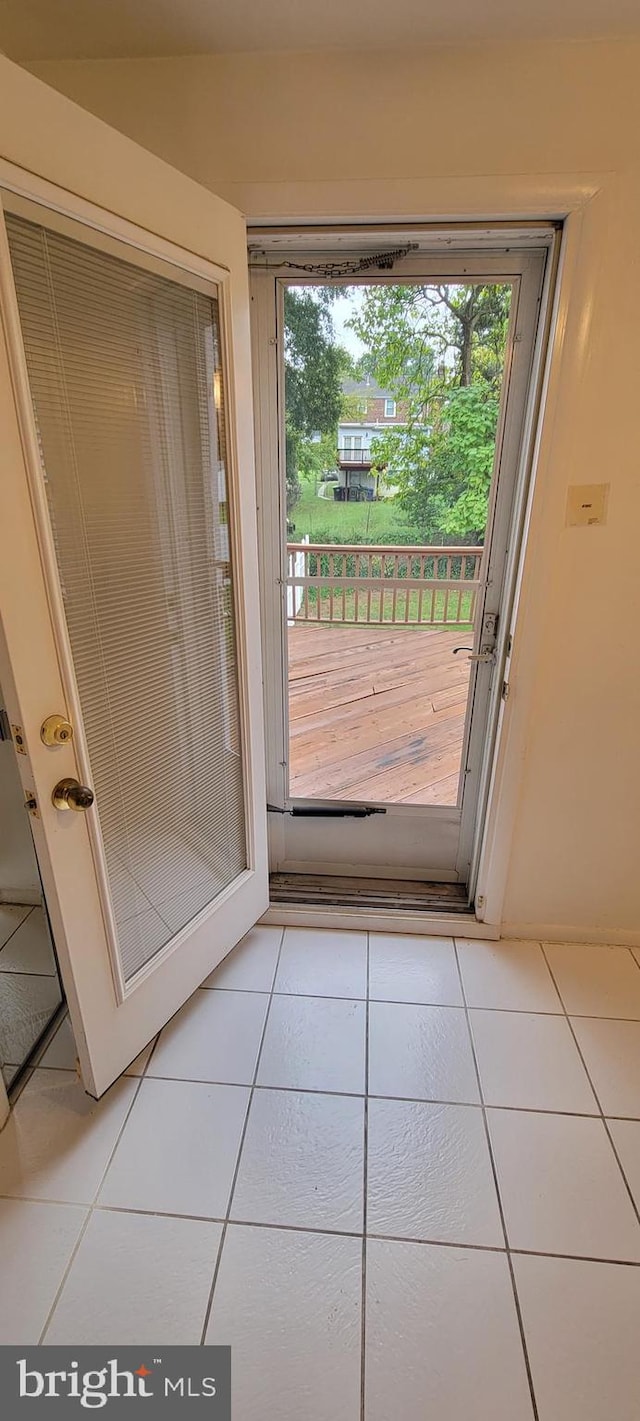 entryway featuring tile patterned flooring