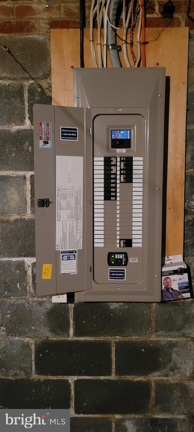 utility room with electric panel