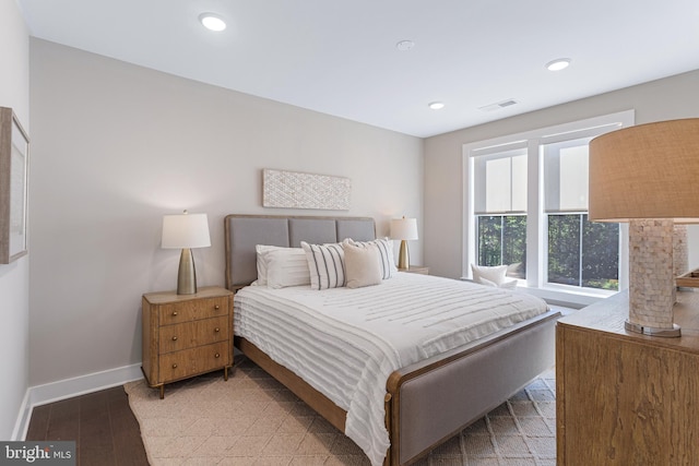 bedroom featuring recessed lighting, light wood-type flooring, visible vents, and baseboards