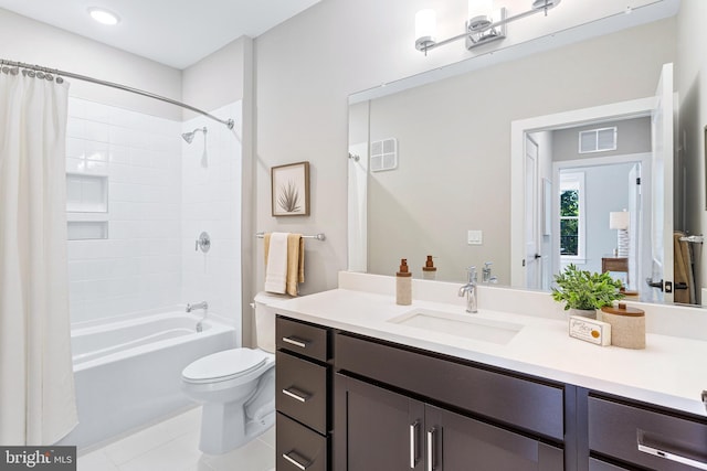 full bathroom with tile patterned flooring, toilet, shower / bath combo with shower curtain, and vanity