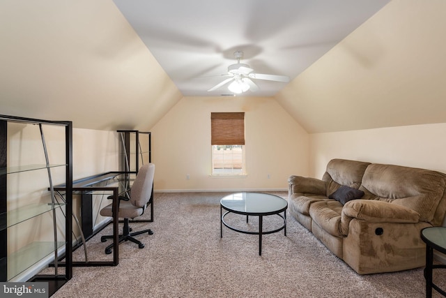 home office featuring vaulted ceiling, carpet floors, and ceiling fan