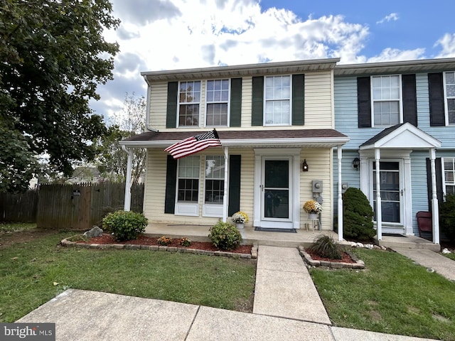 view of front of home with a front lawn