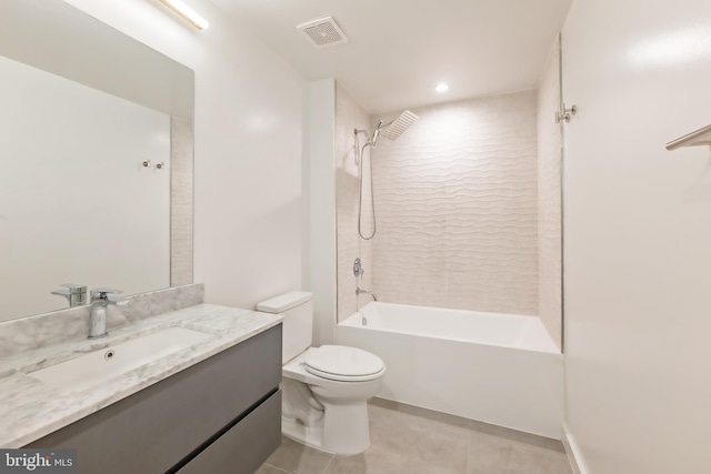 full bathroom with toilet, tile patterned flooring, vanity, and tiled shower / bath combo