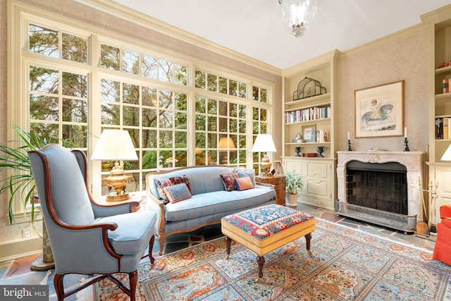 sunroom / solarium featuring plenty of natural light and a premium fireplace