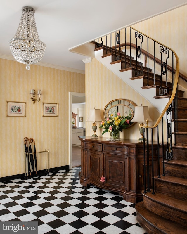 interior space with a notable chandelier and ornamental molding