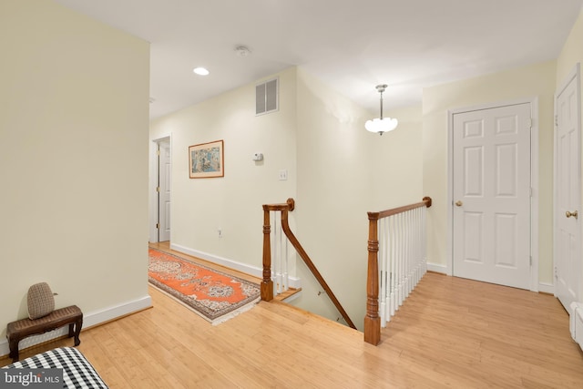 hallway featuring light wood-type flooring