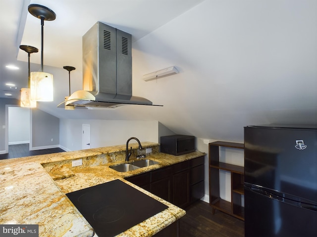 kitchen with hanging light fixtures, island range hood, dark hardwood / wood-style flooring, black appliances, and sink