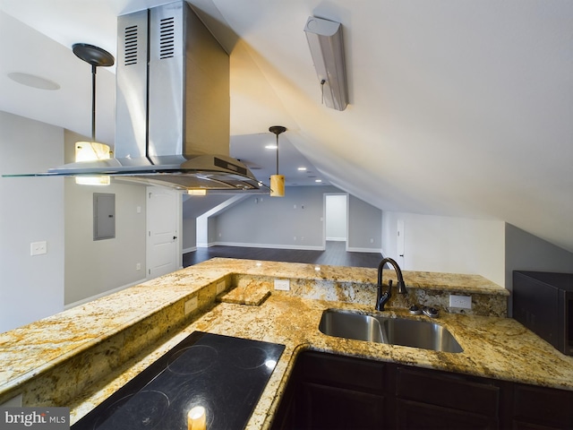 kitchen with island range hood, pendant lighting, lofted ceiling, sink, and stovetop