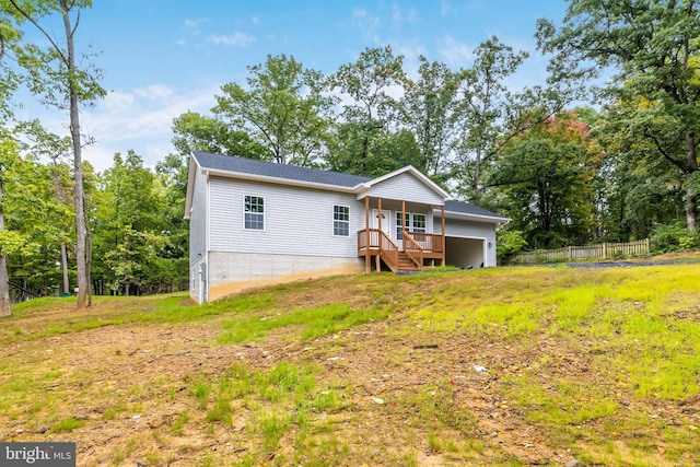 view of front of property featuring a wooden deck