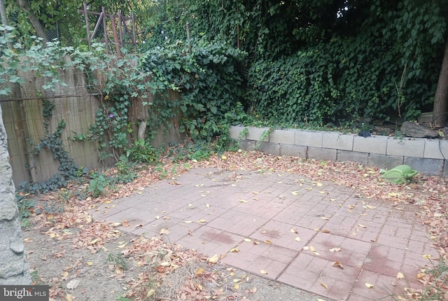 view of patio with fence