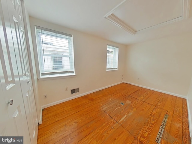 unfurnished room featuring light hardwood / wood-style flooring