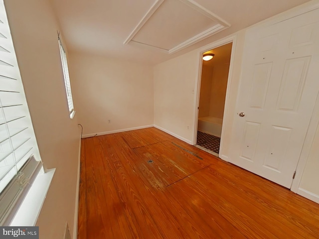 empty room with wood-type flooring