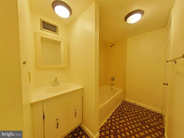 bathroom featuring vanity and shower / bathtub combination