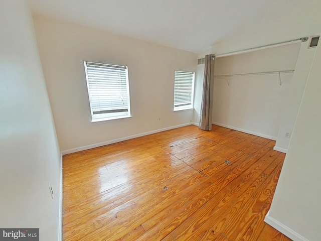 unfurnished room featuring light hardwood / wood-style floors