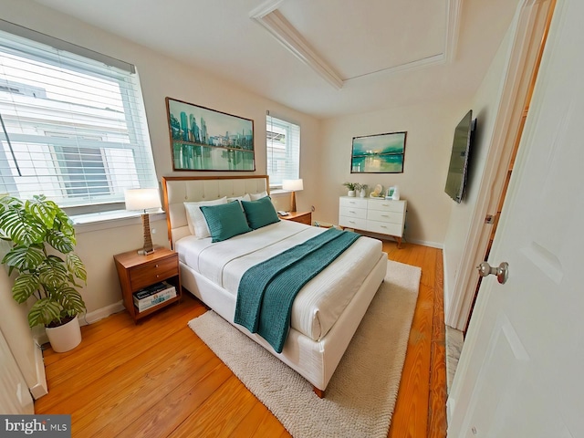 bedroom with light wood-type flooring