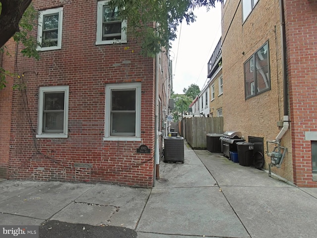 view of home's exterior featuring a patio and central AC