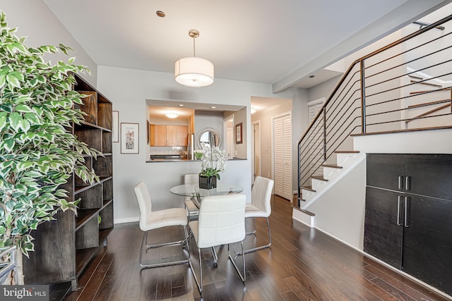 dining room with dark wood-type flooring