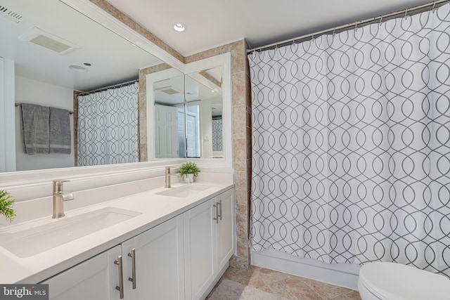 bathroom with tile walls, vanity, a shower with curtain, and toilet