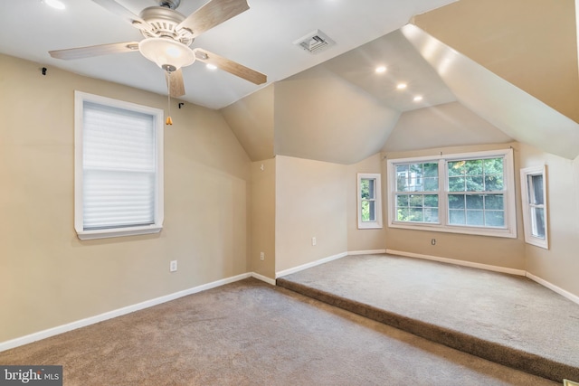 bonus room with ceiling fan, carpet floors, and lofted ceiling