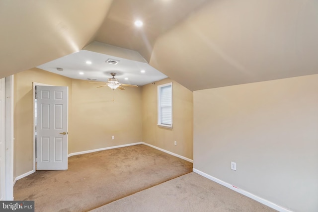 additional living space with carpet floors, vaulted ceiling, and ceiling fan