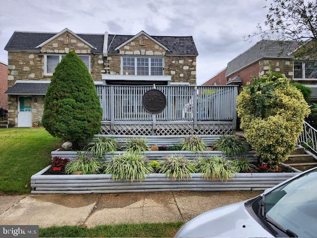 view of front of house with a deck