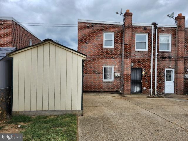 back of property featuring a patio area