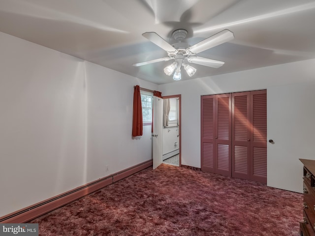 unfurnished bedroom featuring ceiling fan, a closet, carpet flooring, and a baseboard heating unit