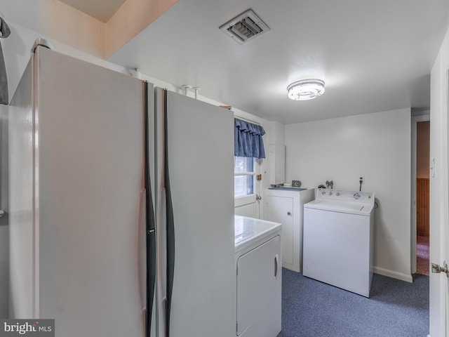 laundry room with washer and clothes dryer