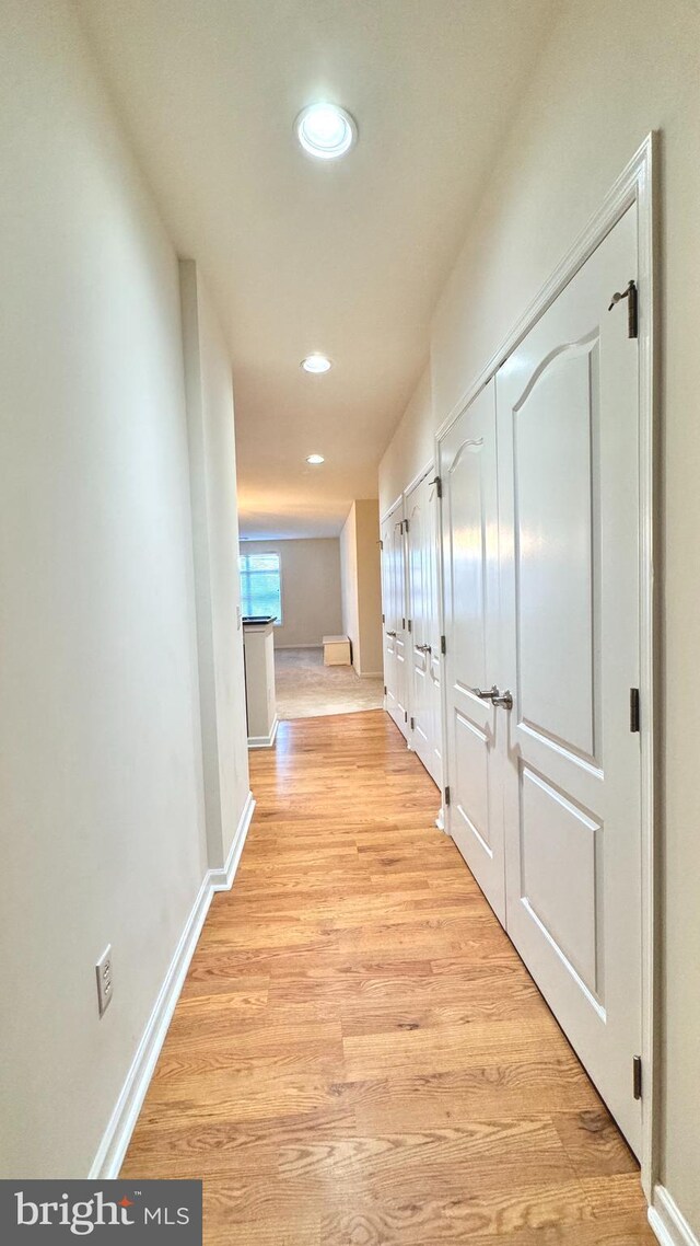 423 Carson Ter, Huntingdon Valley, PA 19006 - hall featuring light wood-style floors, recessed lighting, and baseboards