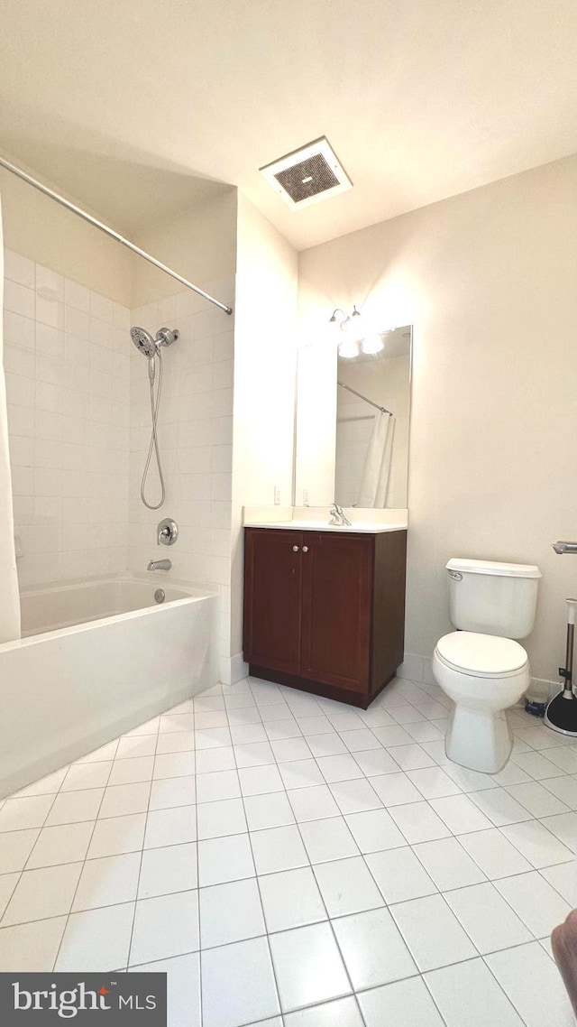 full bathroom with tile patterned floors, vanity, toilet, and tiled shower / bath