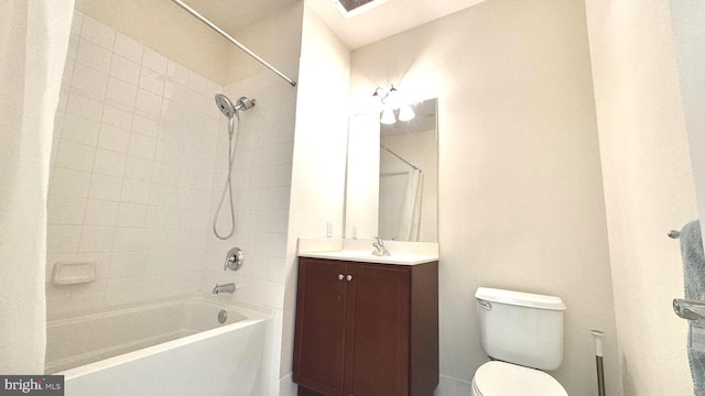 full bathroom featuring vanity, toilet, and tiled shower / bath