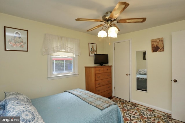 bedroom featuring ceiling fan