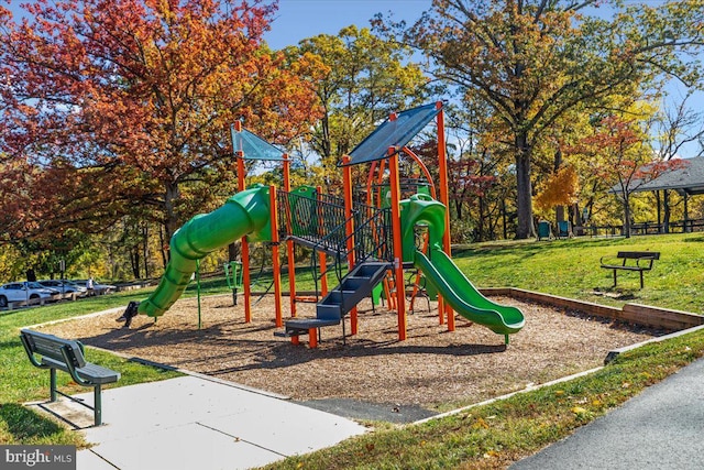 view of jungle gym featuring a yard