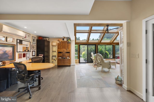 office space featuring hardwood / wood-style flooring and a wall unit AC