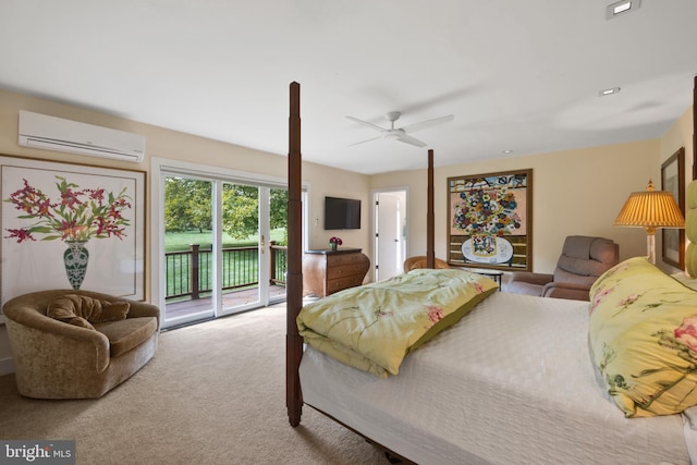 bedroom with access to exterior, light carpet, an AC wall unit, and ceiling fan