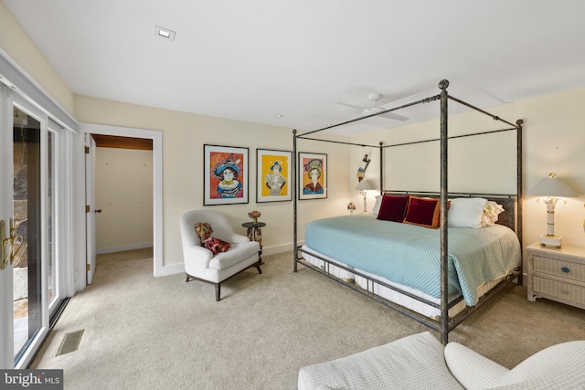 bedroom with access to exterior, light colored carpet, and ceiling fan