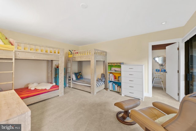 bedroom featuring light colored carpet